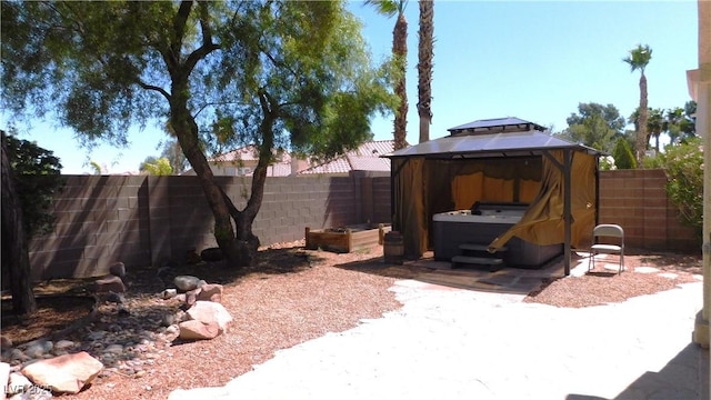 2587 Mizzoni Cir, Henderson, NV 89052 - fenced backyard featuring a gazebo and a patio area