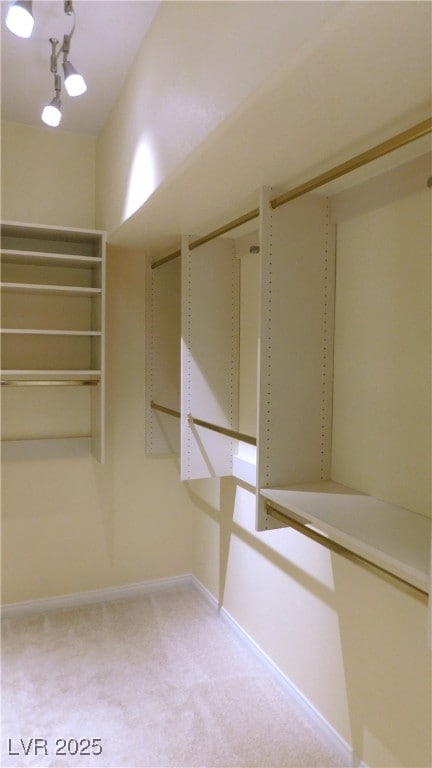 2587 Mizzoni Cir, Henderson, NV 89052 - walk in closet featuring light colored carpet