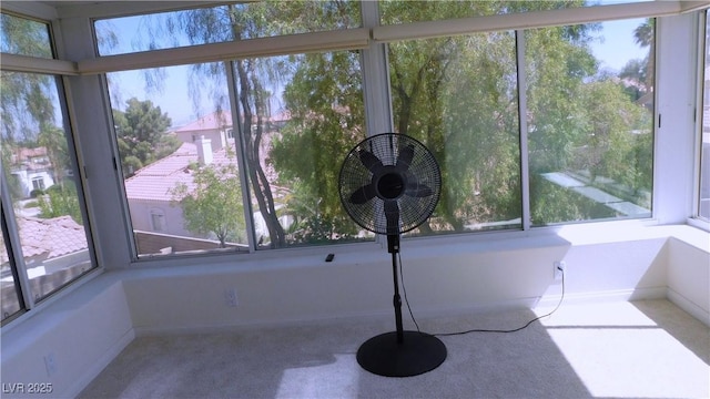 2587 Mizzoni Cir, Henderson, NV 89052 - unfurnished sunroom featuring plenty of natural light and carpet floors