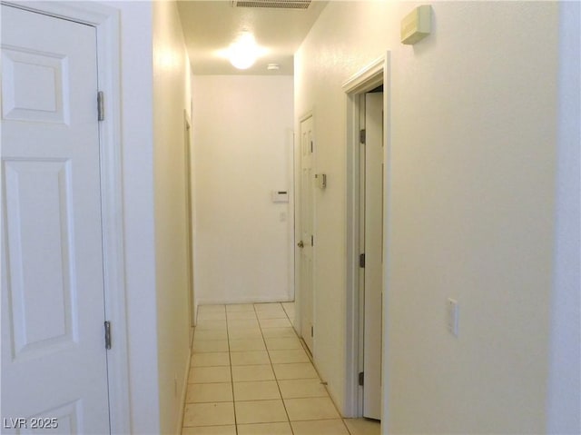 2587 Mizzoni Cir, Henderson, NV 89052 - hallway with light tile patterned flooring