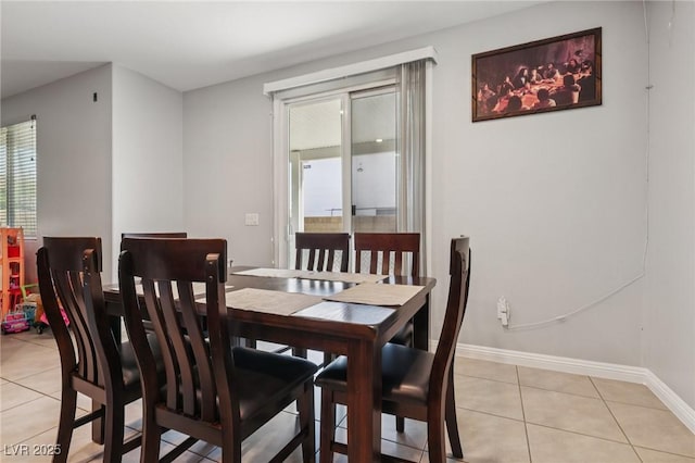 5246 Belmont Mill Ct, Las Vegas, NV 89122 - dining room with light tile patterned floors and baseboards