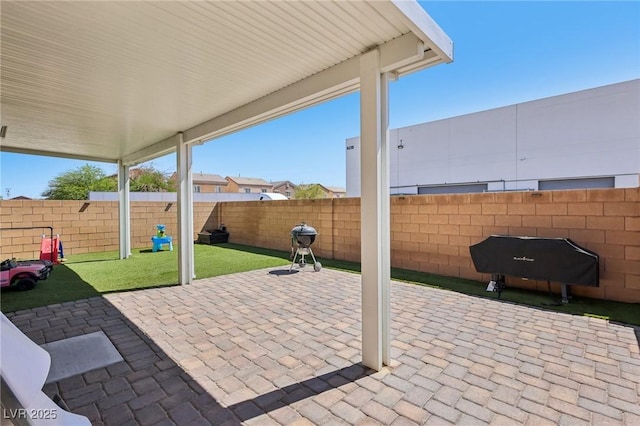 5246 Belmont Mill Ct, Las Vegas, NV 89122 - fenced backyard featuring a patio area