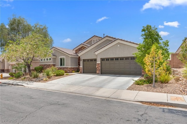 5681 Exotic Rosette Ave, Las Vegas, NV 89139 - view of front of home with stucco siding, a garage, driveway, stone siding, and a tile roof