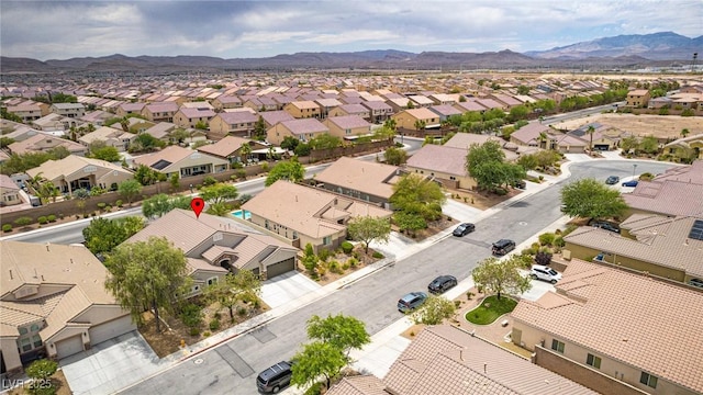 5681 Exotic Rosette Ave, Las Vegas, NV 89139 - aerial view of residential area featuring a mountainous background