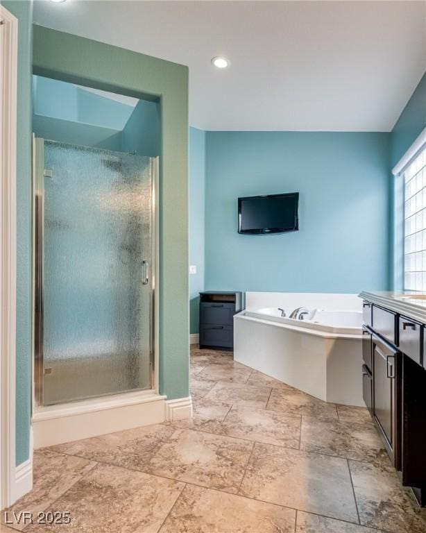 5681 Exotic Rosette Ave, Las Vegas, NV 89139 - full bath featuring a shower stall, vanity, a garden tub, and recessed lighting