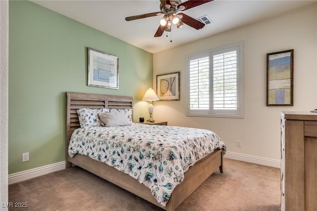 5681 Exotic Rosette Ave, Las Vegas, NV 89139 - carpeted bedroom with baseboards and ceiling fan