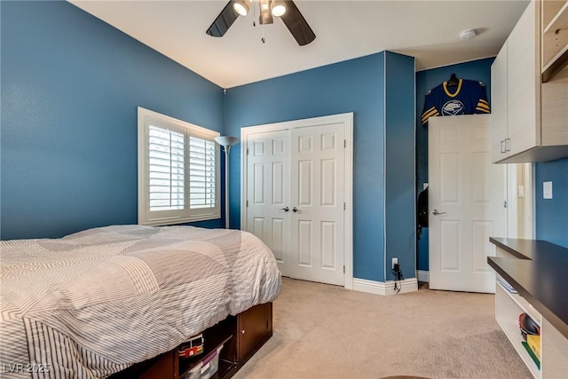 5681 Exotic Rosette Ave, Las Vegas, NV 89139 - bedroom featuring light carpet, a closet, and ceiling fan