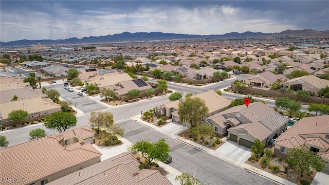 5681 Exotic Rosette Ave, Las Vegas, NV 89139 - aerial perspective of suburban area with a mountainous background
