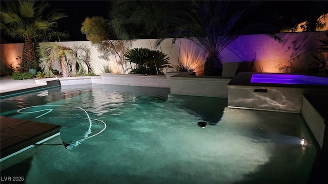 5681 Exotic Rosette Ave, Las Vegas, NV 89139 - view of pool at night