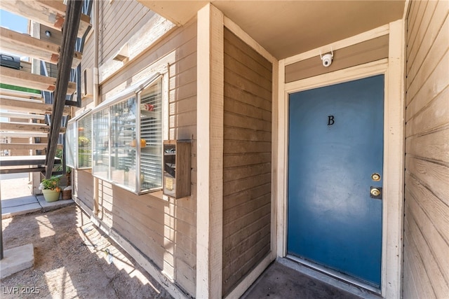 2666 Aarondavid Dr, Las Vegas, NV 89121 - view of exterior entry featuring a security system