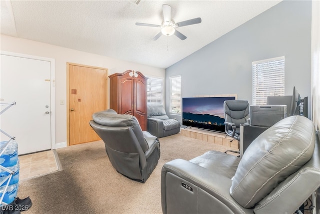 2666 Aarondavid Dr, Las Vegas, NV 89121 - living room with a ceiling fan, carpet flooring, lofted ceiling, and a textured ceiling