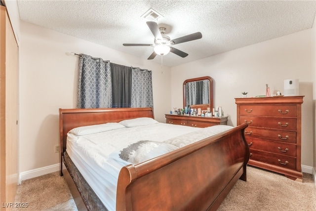 2666 Aarondavid Dr, Las Vegas, NV 89121 - bedroom featuring light carpet, a textured ceiling, and ceiling fan