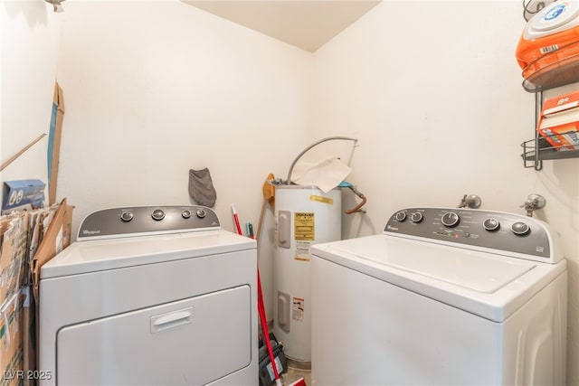 2666 Aarondavid Dr, Las Vegas, NV 89121 - laundry room with water heater and washing machine and dryer