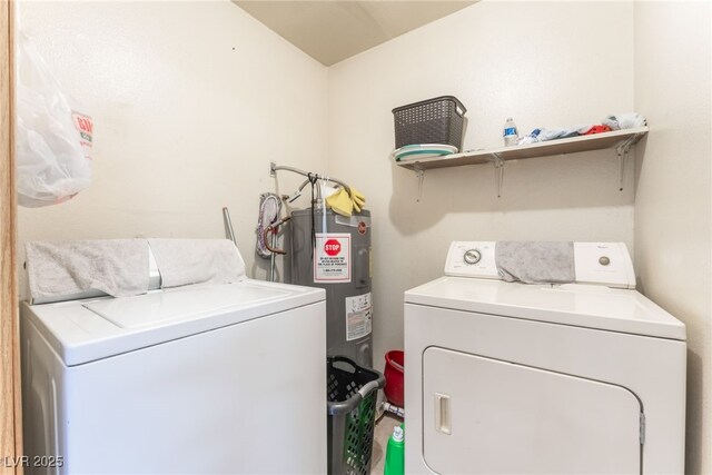 2666 Aarondavid Dr, Las Vegas, NV 89121 - laundry area with washing machine and clothes dryer and water heater