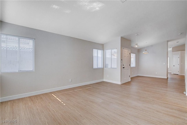 1005 Transom Dr, Las Vegas, NV 89128 - empty room with light wood-style floors and baseboards