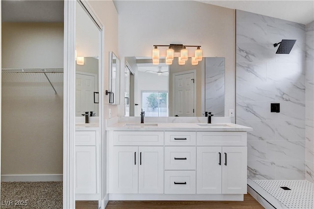 1005 Transom Dr, Las Vegas, NV 89128 - full bathroom with a marble finish shower, double vanity, and a walk in closet