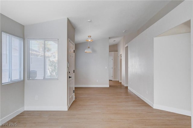 1005 Transom Dr, Las Vegas, NV 89128 - spare room with light wood-type flooring and baseboards