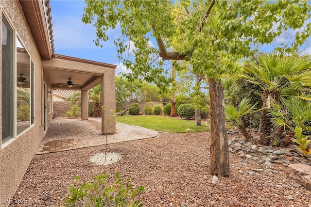 2244 Savannah River St, Henderson, NV 89044 - fenced backyard featuring ceiling fan and a patio area