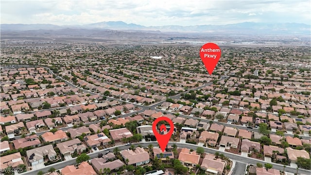 2244 Savannah River St, Henderson, NV 89044 - aerial overview of property's location featuring a mountain backdrop and nearby suburban area
