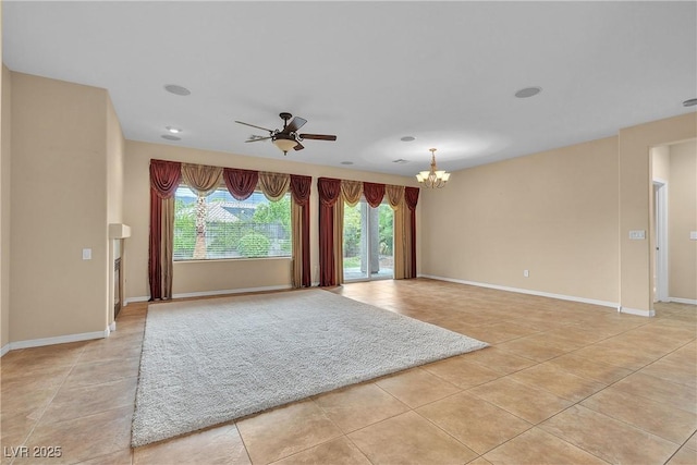 2244 Savannah River St, Henderson, NV 89044 - unfurnished room with light tile patterned flooring, ceiling fan, and a chandelier