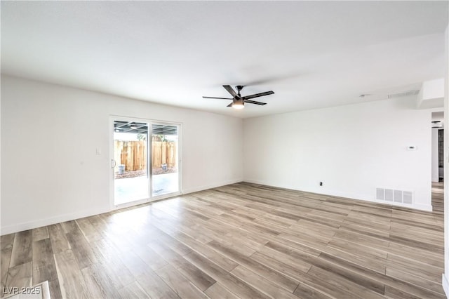 516 Donner St, Las Vegas, NV 89107 - empty room with ceiling fan and light wood-style flooring