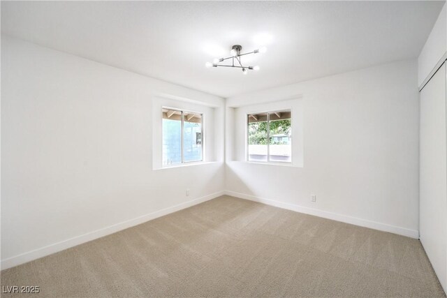 516 Donner St, Las Vegas, NV 89107 - empty room with light carpet