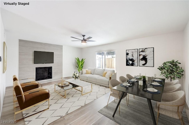 516 Donner St, Las Vegas, NV 89107 - living area with ceiling fan, wood finished floors, and a premium fireplace