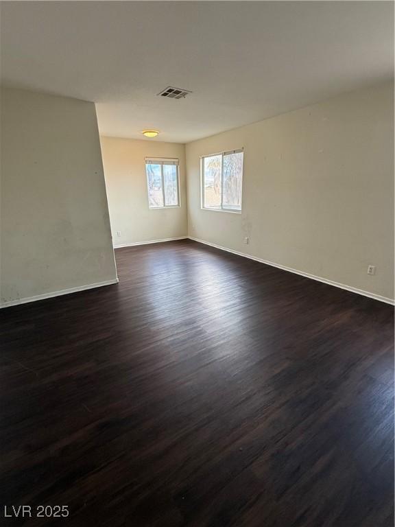 216 Night Fall Ter, Henderson, NV 89015 - spare room featuring dark wood finished floors and baseboards