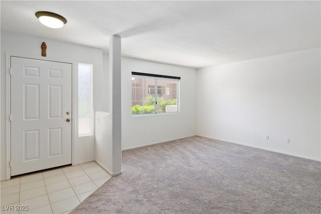 2219 Rugged Mesa Dr, Laughlin, NV 89029 - entrance foyer with light colored carpet and baseboards