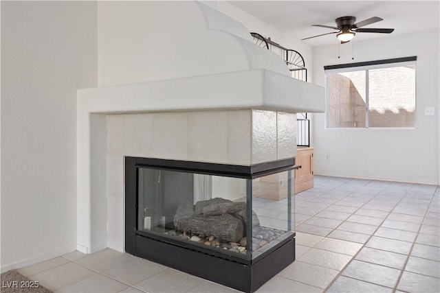 2219 Rugged Mesa Dr, Laughlin, NV 89029 - detailed view of ceiling fan and a fireplace