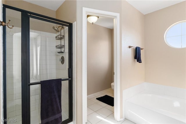 2219 Rugged Mesa Dr, Laughlin, NV 89029 - bathroom featuring a stall shower, a garden tub, and tile patterned flooring