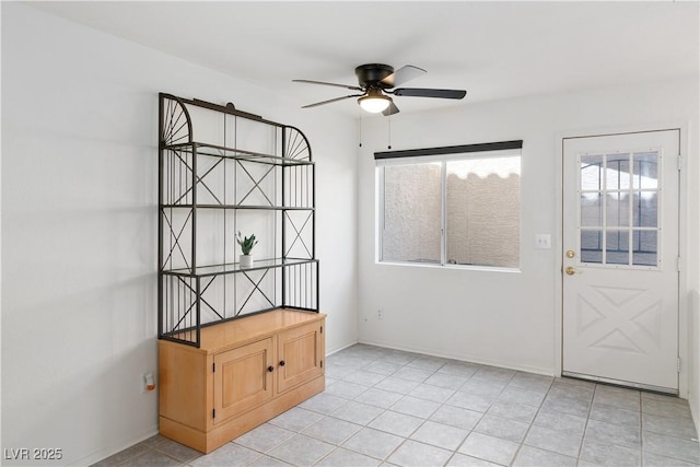 2219 Rugged Mesa Dr, Laughlin, NV 89029 - entrance foyer with ceiling fan and light tile patterned flooring