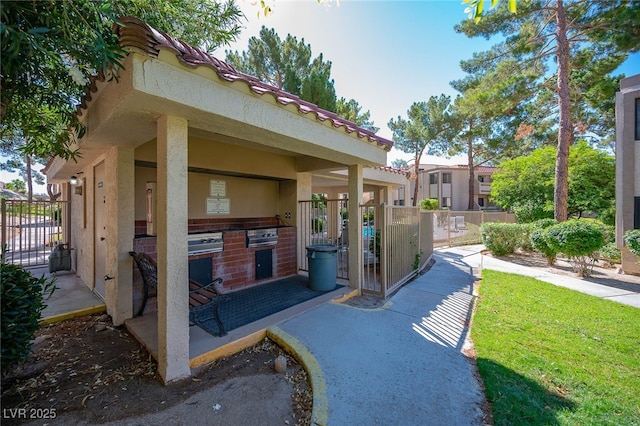 3740 Desert Marina Dr Unit 7, Laughlin, NV 89029 - view of patio with area for grilling and a gate