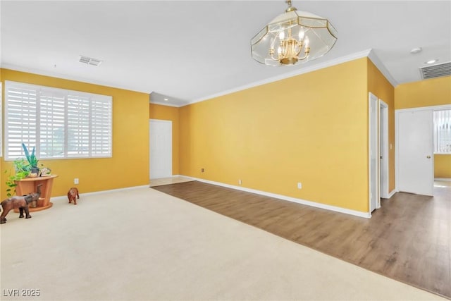 9605 Rainfall Ave, Las Vegas, NV 89147 - carpeted spare room with a chandelier, crown molding, recessed lighting, and wood finished floors