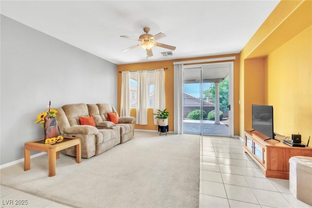 9605 Rainfall Ave, Las Vegas, NV 89147 - living area featuring a ceiling fan, light carpet, and light tile patterned flooring
