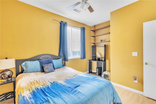 9605 Rainfall Ave, Las Vegas, NV 89147 - bedroom with wood finished floors and a ceiling fan
