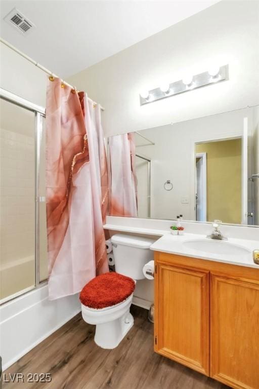9605 Rainfall Ave, Las Vegas, NV 89147 - full bath featuring enclosed tub / shower combo, wood finished floors, and vanity