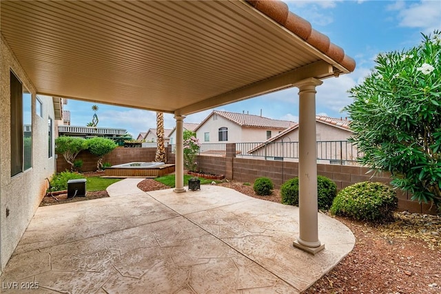 9605 Rainfall Ave, Las Vegas, NV 89147 - fenced backyard featuring a patio and a jacuzzi