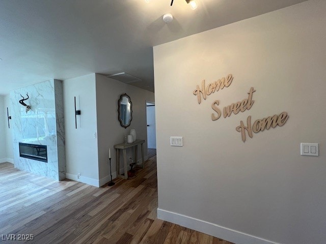 2712 Rialto Rd, Las Vegas, NV 89108 - hall featuring wood finished floors and baseboards