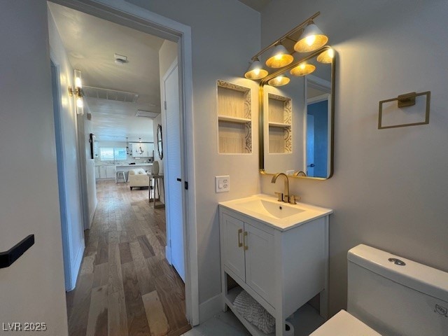 2712 Rialto Rd, Las Vegas, NV 89108 - bathroom with vanity and wood finished floors