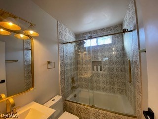 2712 Rialto Rd, Las Vegas, NV 89108 - bathroom with tiled shower / bath and vanity