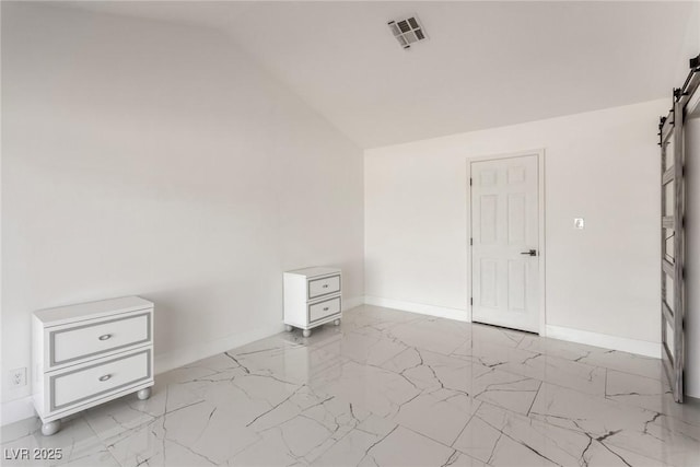 3826 Edmund St, Las Vegas, NV 89103 - spare room featuring marble finish floors and vaulted ceiling