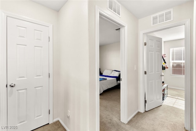 10940 Oregano Ave, Las Vegas, NV 89166 - hallway with carpet and baseboards