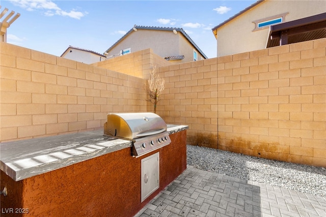 10940 Oregano Ave, Las Vegas, NV 89166 - view of patio with exterior kitchen