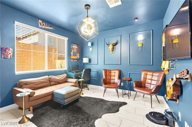 10940 Oregano Ave, Las Vegas, NV 89166 - living room featuring marble look tiles and baseboards
