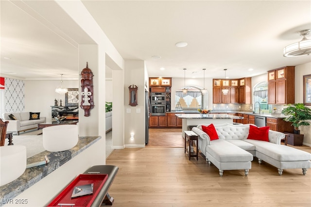 6595 Creekside Cellars Ct, Las Vegas, NV 89139 - living room with light wood-style flooring, recessed lighting, and a chandelier