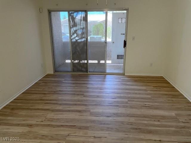 5130 Mandalay Springs Dr Unit 103, Las Vegas, NV 89120 - unfurnished room with wood finished floors