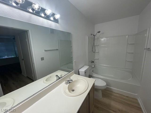 5130 Mandalay Springs Dr Unit 103, Las Vegas, NV 89120 - full bath featuring wood finished floors, vanity, and bathtub / shower combination