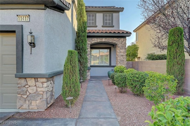 11417 Rock Cove Way, Las Vegas, NV 89141 - entrance to property featuring stone siding, stucco siding, and a tile roof