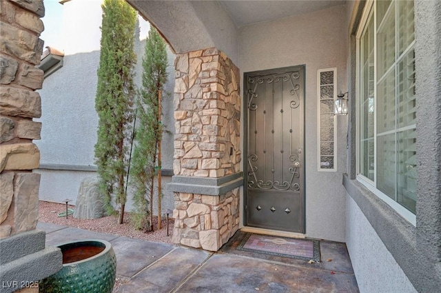 11417 Rock Cove Way, Las Vegas, NV 89141 - doorway to property with stone siding and stucco siding